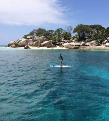 Cathy Samé Lottin SUP Six Senses Resort Zil Pasyon Seychelles Spa Paddling to coco island Ocean Love